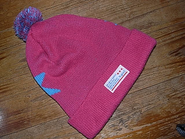 X girl knitted cap one size unused.