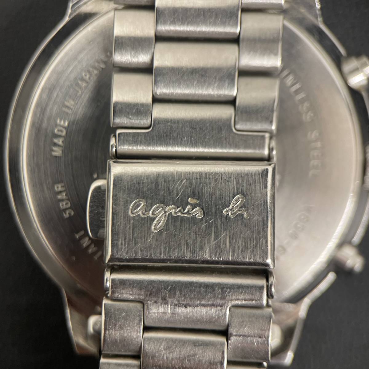 [A11-17]【不動品 現状品】agnes b アニエスベー クロノグラフ 腕時計 クウォーツ V654-6100 時計 ヴィンテージ 3針 黒文字盤 _画像5