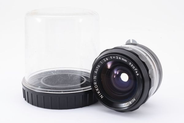 [Rank:AB] 完動良品 Nikon Nikkor-N Auto 24mm F2.8 MF Wide Lens MF一眼レフ用 単焦点 広角 レンズ / ニコン おまけでケース付 #3089の画像1