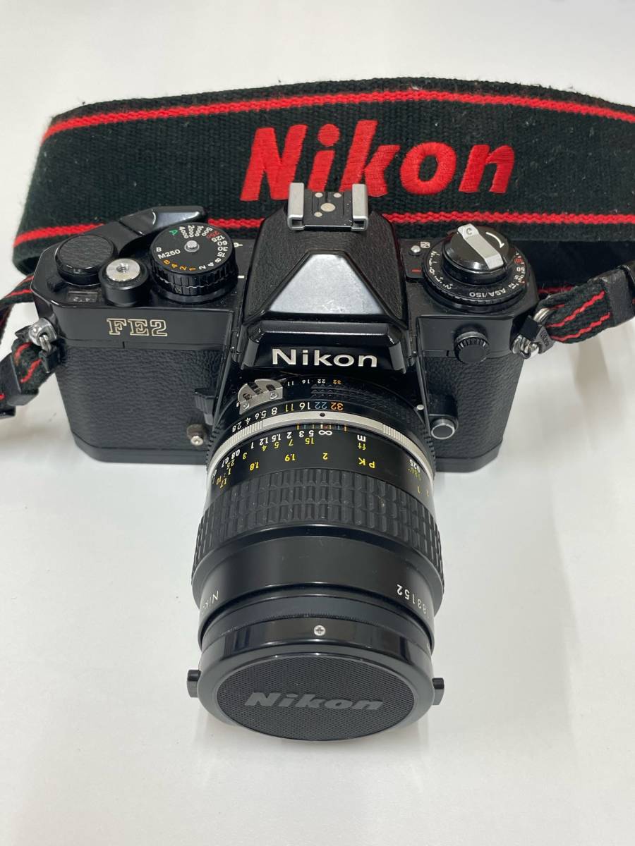 FS549 一眼レフカメラ Nikon ニコン FE2 ブラック 黒 レンズセット フィルムカメラ マニュアルフォーカス ネックストラップ付き 現状品_画像1