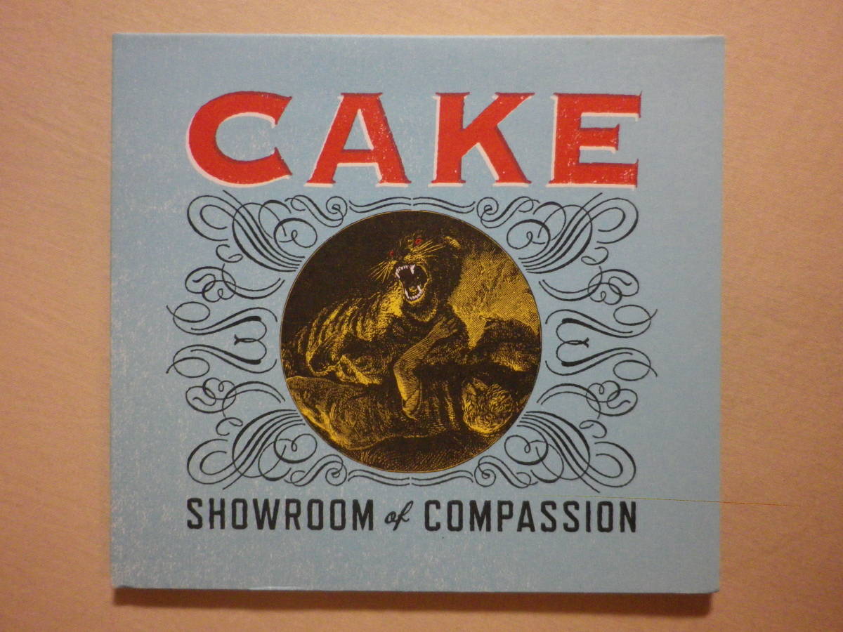 『Cake/Showroom Of Compassion(2011)』(Upbeat Records 7 44626 99332 1,USA盤,特殊ジャケ,Mustache Man,Sick Of You)_画像1