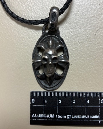  raw front Gabor Skull on oval Cross pendant 