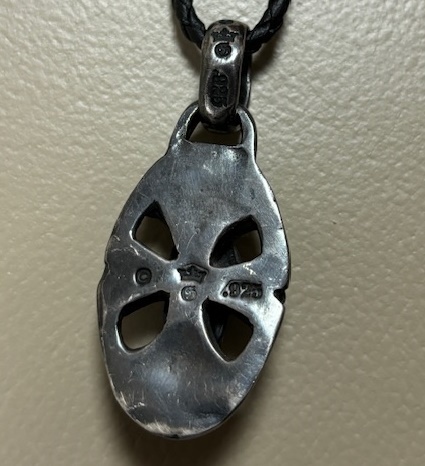  raw front Gabor Skull on oval Cross pendant 