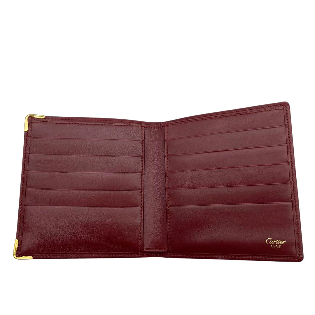 Cartier Cartier folding in half . inserting purse Must line leather bordeaux 