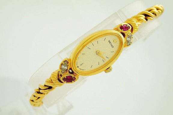 K166* SEIKO Seiko 1E20-5760 color stone Gold gold face woman lady's woman quartz wristwatch stylish operation excellent tax included 
