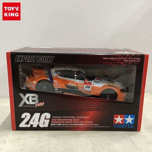 1円〜 未開封 タミヤ XB（エキスパートビルト） 1/10 au TOM‘S GR スープラ（TT-02シャーシ） 2チャンネル プロポ（送信機）付き_画像1