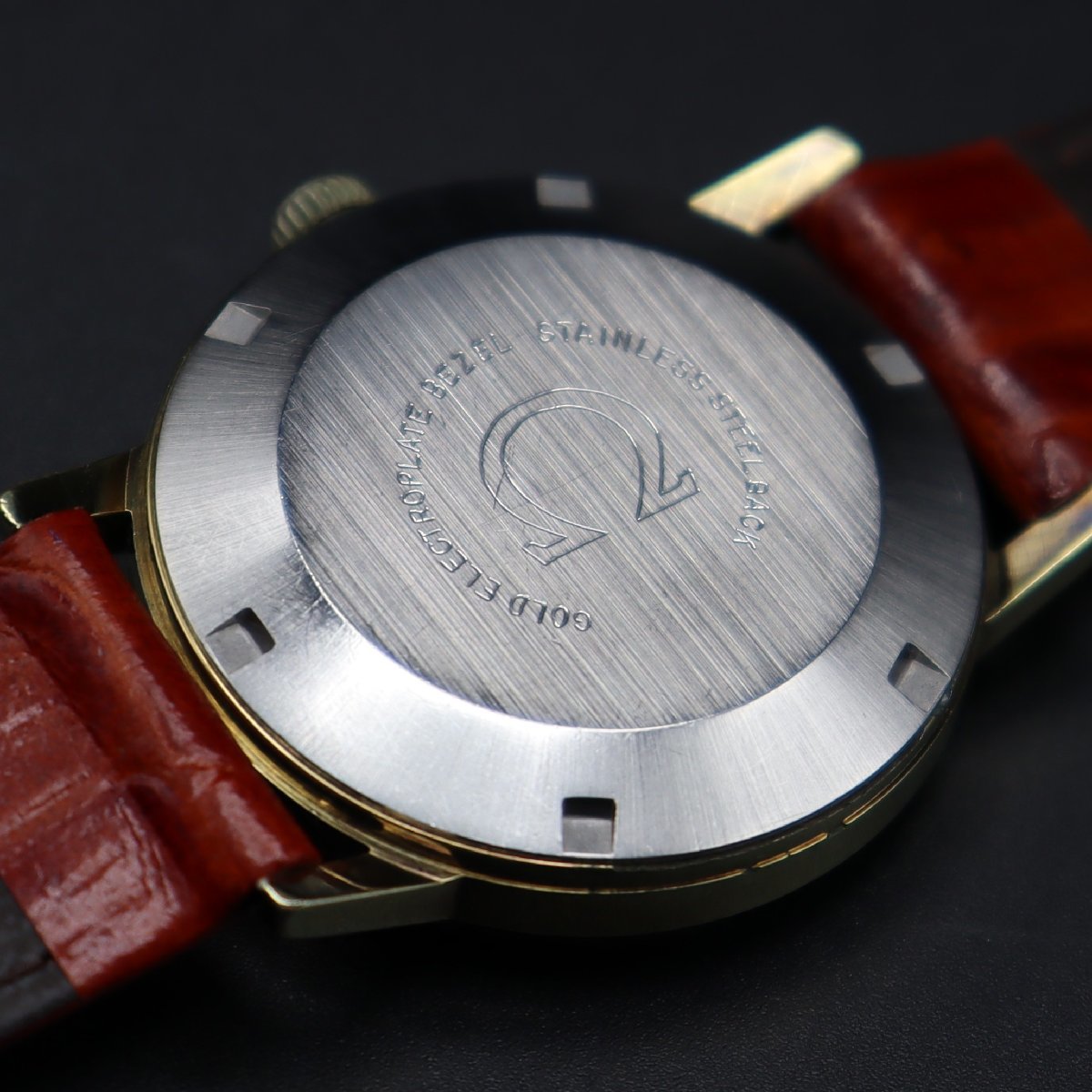希少 Cal.563 OMEGA オメガ Ref.166.070 自動巻き ゴールドカラー 1970年製造 ベルト新品 デイト スイス製 アンティーク メンズ腕時計_画像6