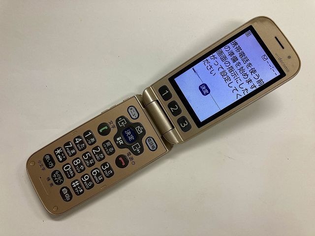 AD884 docomo F-08C ゴールド ジャンク_画像1