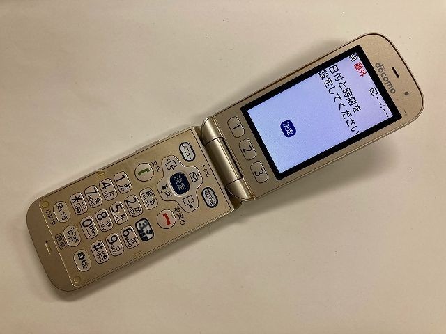 AE336 docomo F-01G ゴールド_画像1