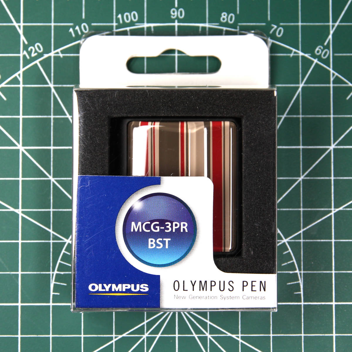 OLYMPUS オリンパス プレミアムカメラグリップ ストライプ柄 MCG-3PR 未使用品 安心の全国一律送料 匿名ネコポス便発送_画像1