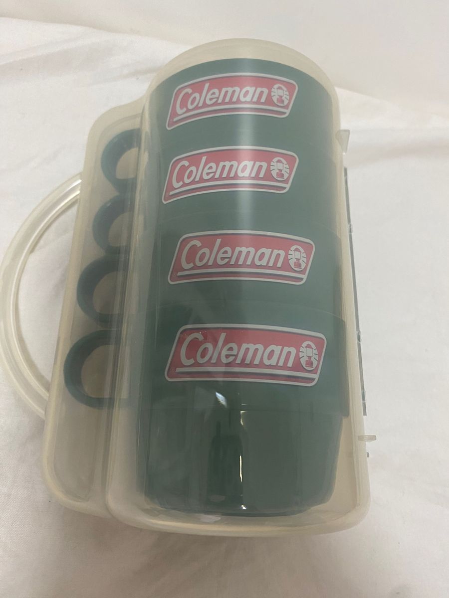 新品未使用　COLEMAN  ×三菱自動車　クッション型ブランケット/ひざ掛け　とコールマン スタッキングマグ　プラカップ　セット