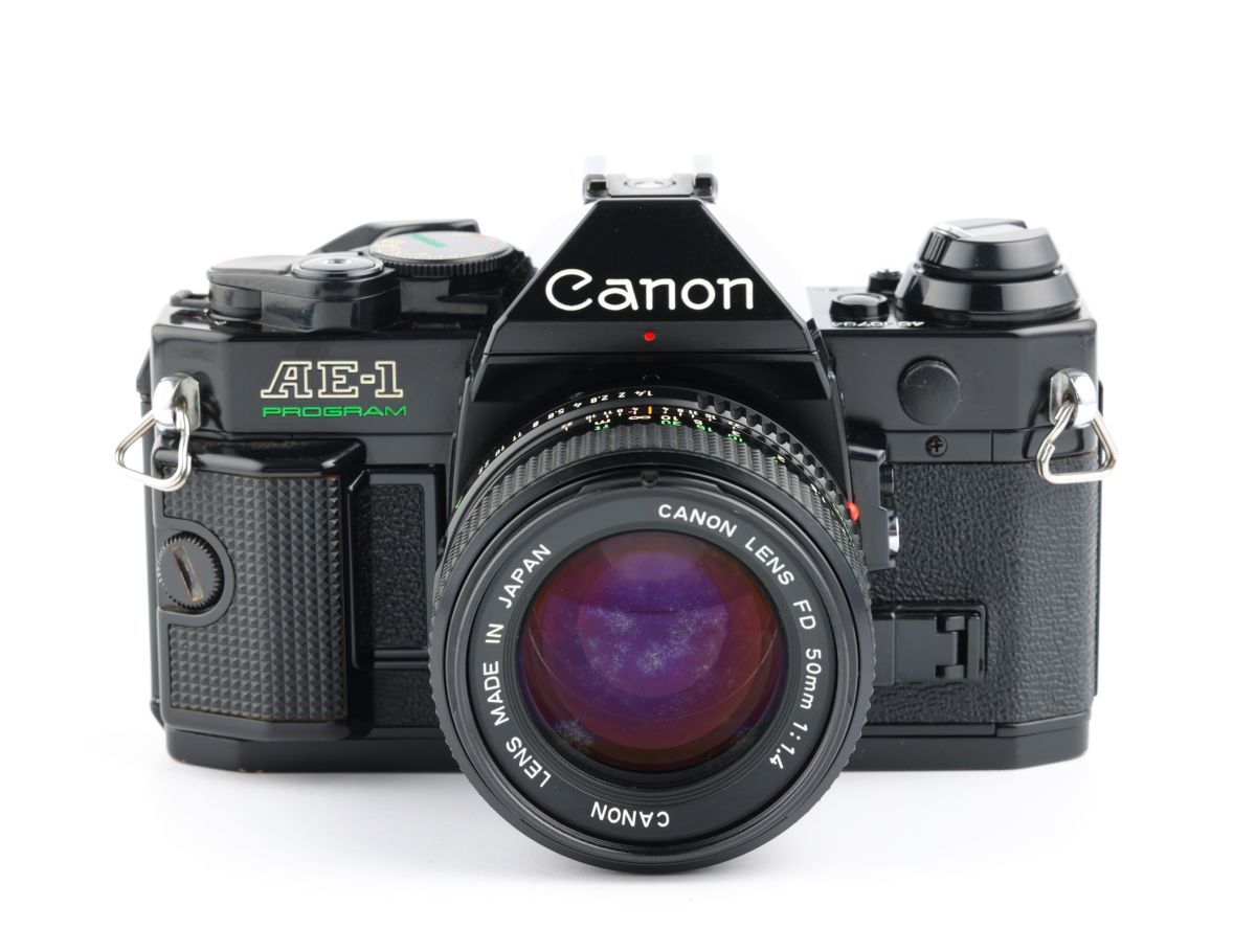 03341cmrk Canon AE-1P PROGRAM + New FD 50mm F1.4 MF一眼レフ フイルムカメラ 標準レンズ_画像1