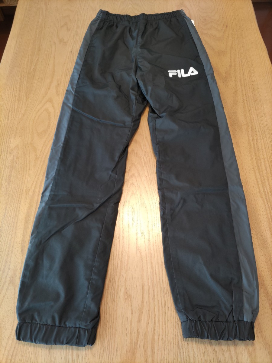 未使用☆タグ付☆フィラ。FILA。パンツ。サイズ150。男女兼用。ブラック。黒。スポーツ。防寒。_画像1