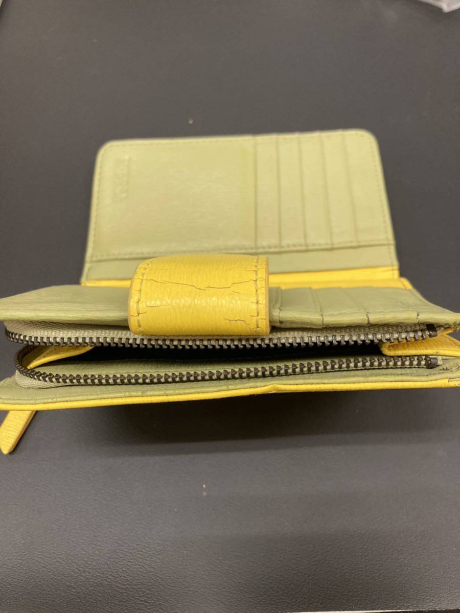 J6c56 ディーゼル　財布　二つ折り財布 黄色　コインケース _画像4
