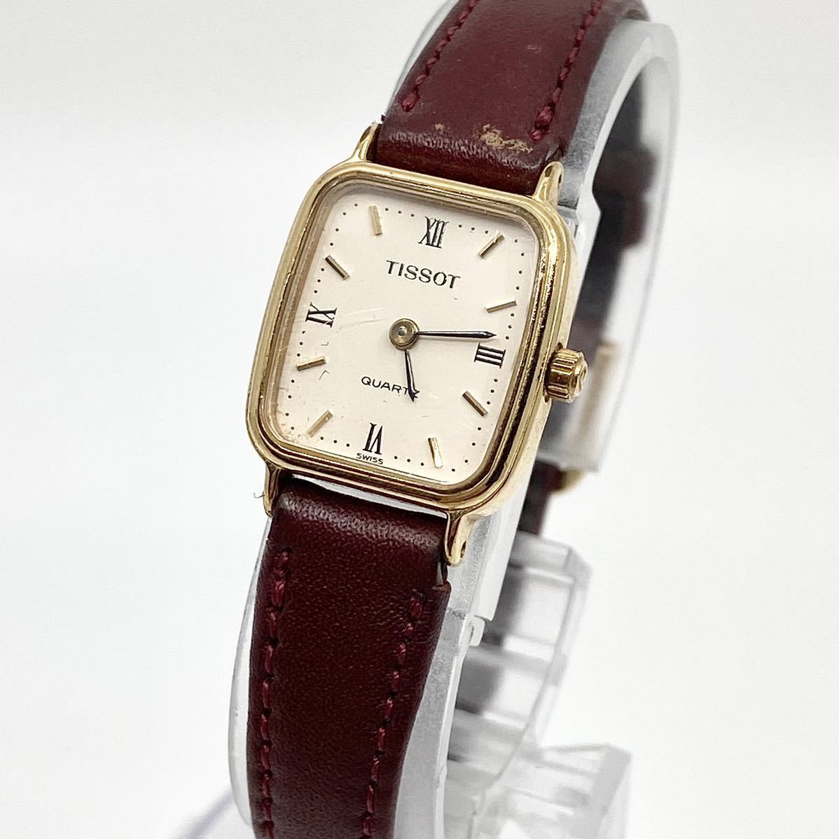 TISSOT 腕時計 クォーツ quartz 2針 Swiss スイス製 レザーベルト ホワイト ゴールド ブラウン 白 金 茶 maruman ティソ Y185_画像1