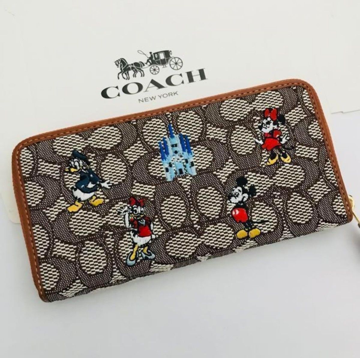 COACHコーチ長財布 レディースのブラウン色新品財布 DISNEY COACHコーチ長財布 レディースのブラウン色新品財布 DISNEY