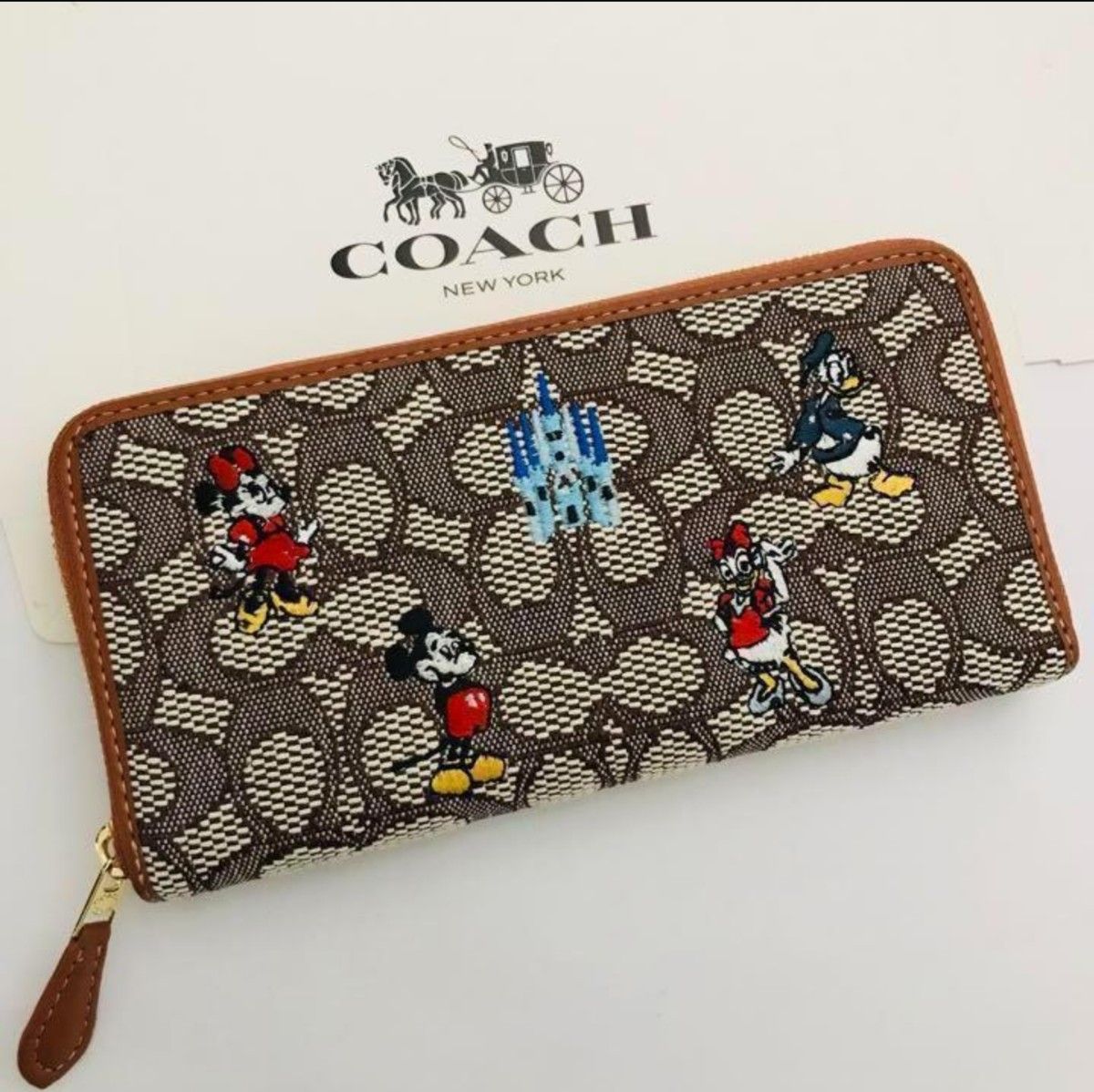 COACHコーチ長財布 レディースのブラウン色新品財布 DISNEY COACHコーチ長財布 レディースのブラウン色新品財布 DISNEY