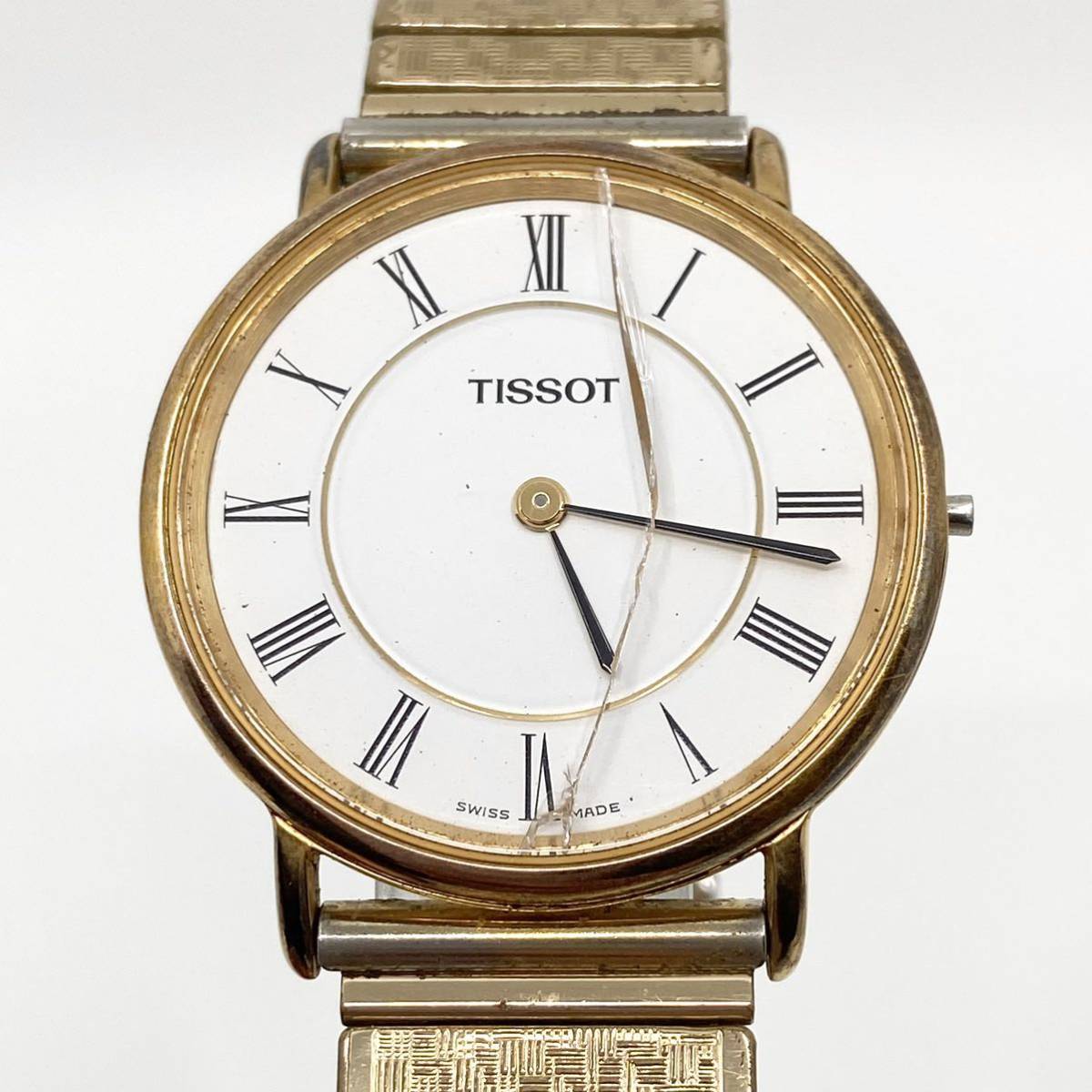 TISSOT 腕時計 蛇腹ベルト ローマンインデックス quartz クォーツ 2針 Swiss スイス製 ホワイト ゴールド 白 金 ティソ D46の画像4