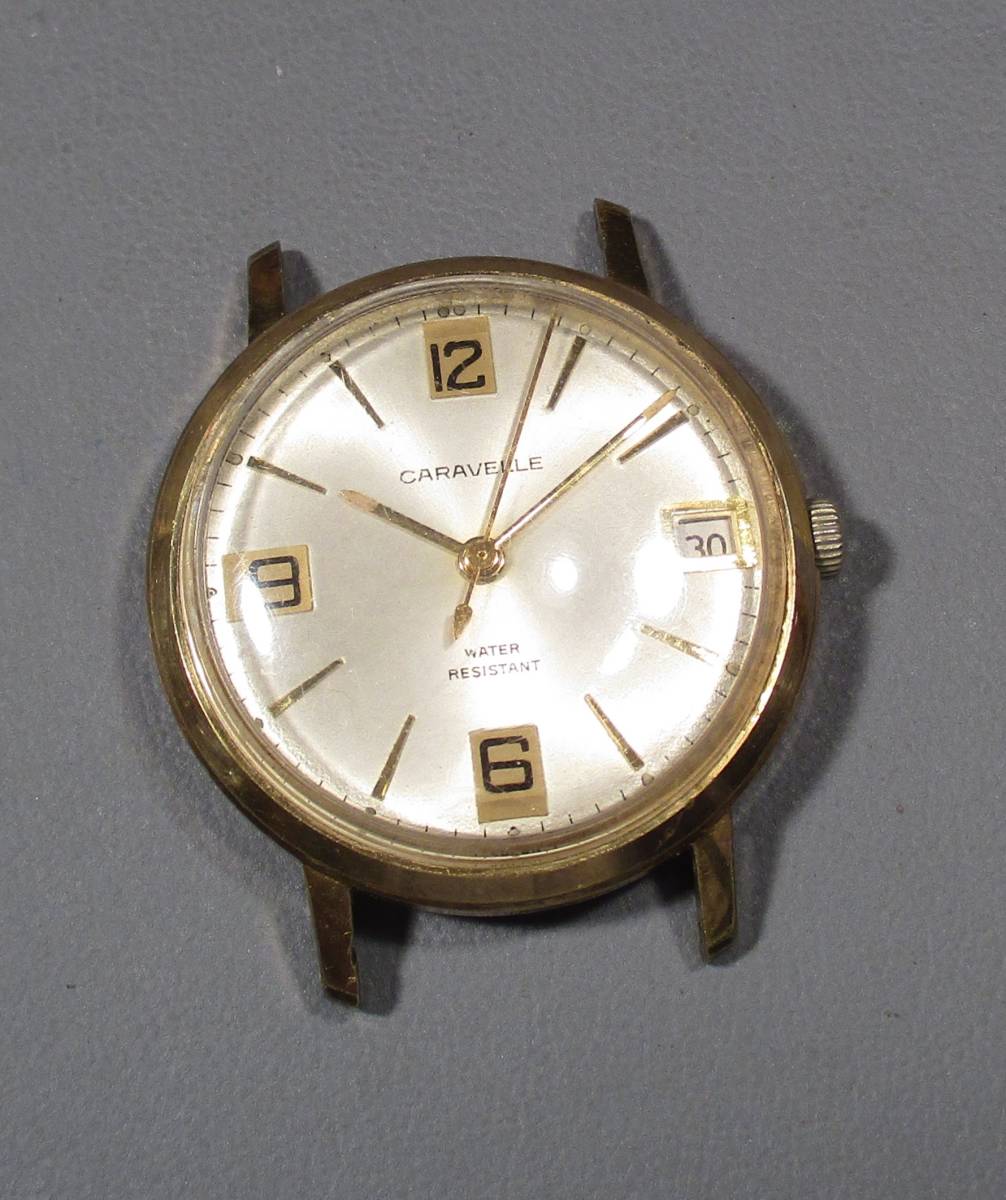 ☆ CARAVELLE . 金張 紳士用腕時計 日付 日本製１９６０年代_画像1