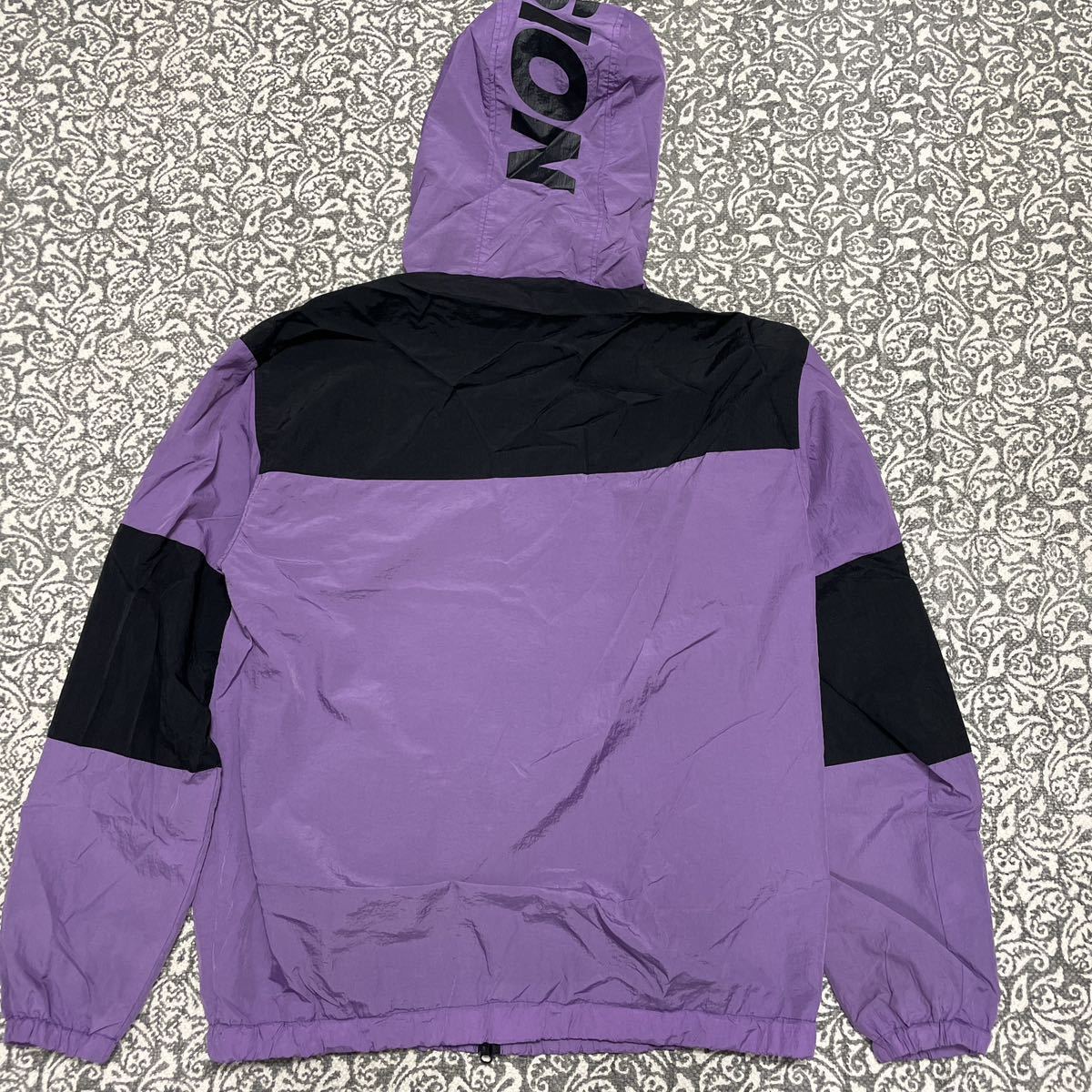 VISION STREET WEAR Vision Street wear nylon jacket M size purple black purple black with a hood .