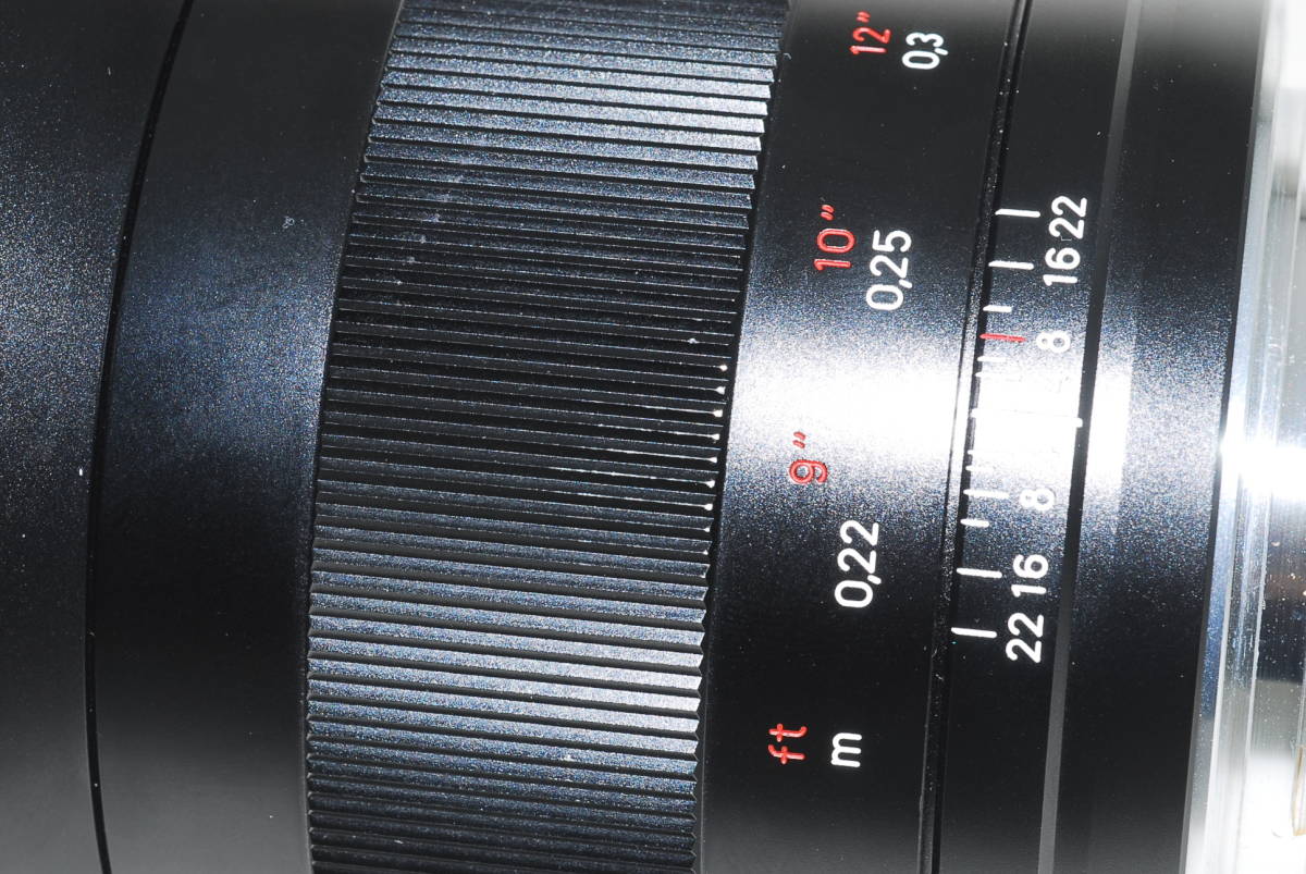 * superior article *Carl Zeiss DISTAGONti start gonT* 21mm F2.8 ZE CANON Canon EF mount with a hood .!