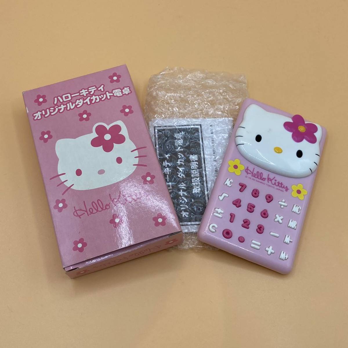 【2268】ハローキティ オリジナルダイカット 電卓　Hello Kitty　サンリオ　元箱付き　現状品　景品　ピンク　2000年代_画像1