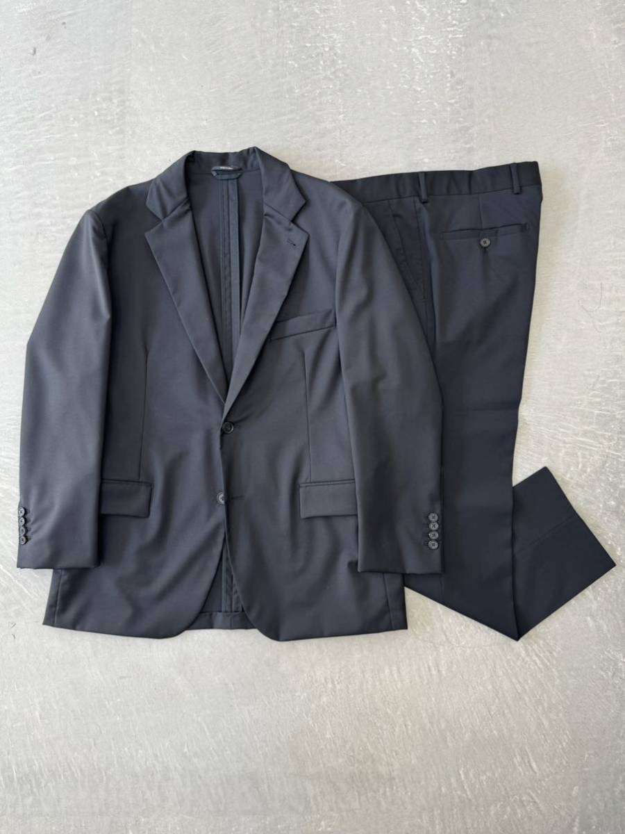 エルメス ウール スーツ 50 ブラック HERMES セットアップ テーラード 羊毛 黒 モダン ブラックスーツ フォーマル