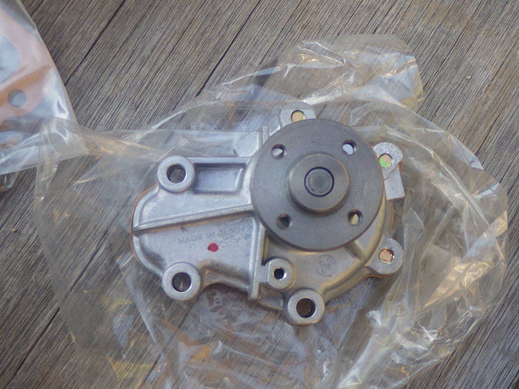 [ Daihatsu water pump unused goods ] old car L40 G10 16100-87705-000 16100-87706-000 MAXk.-re Charade 