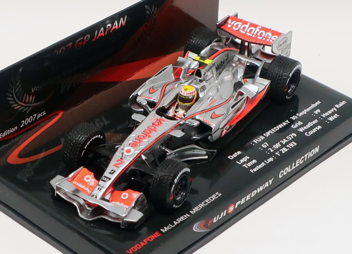 ミニチャンプス 1/43 富士スピードウェイ特注 マクラーレン メルセデス MP4-22 L.ハミルトン 2007 日本GP 優勝(ジャンク)_ボディの一部がツブツブになっています