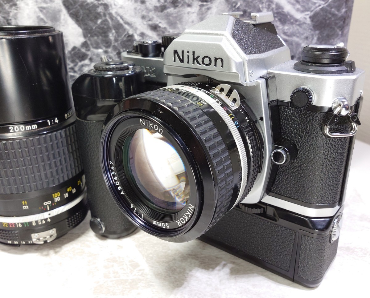【終活整理】Nikon NEW FM2＋Ai NIKKOR 50mm f1.4＋200mm f4 単焦点2本セット＋モータードライブMD-12 各動作良好 露出計OK 光学連写OK _画像3