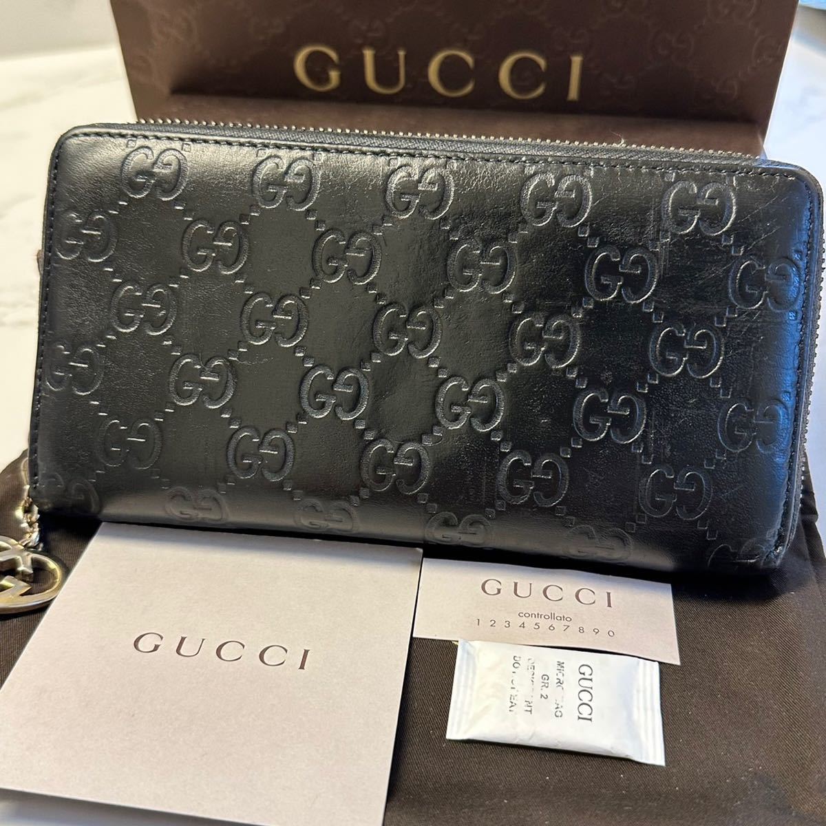 グッチ　GUCCI 財布　長財布　シマレザー　ハート金具　ラウンドファスナー　レディース_画像1