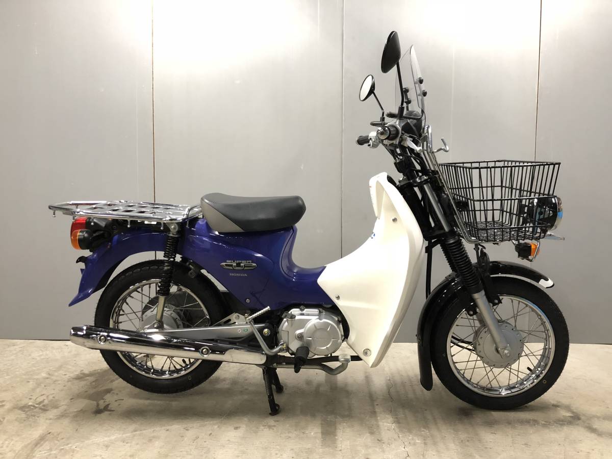 Супер каб 50. Honda Cub 50. Honda super Cub 110. Honda super Cub 50. Мопед Honda super Cub.