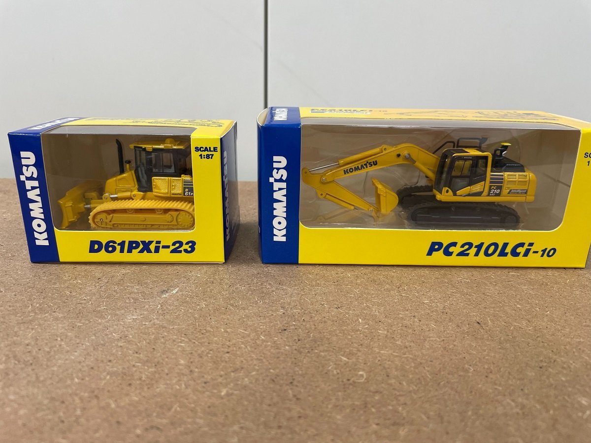 【J16962】KOMATSU　ミニカー2点おまとめ　PC210CCi-10　D61PXi-23　スケール1:87　元箱付　経年保管品_画像1