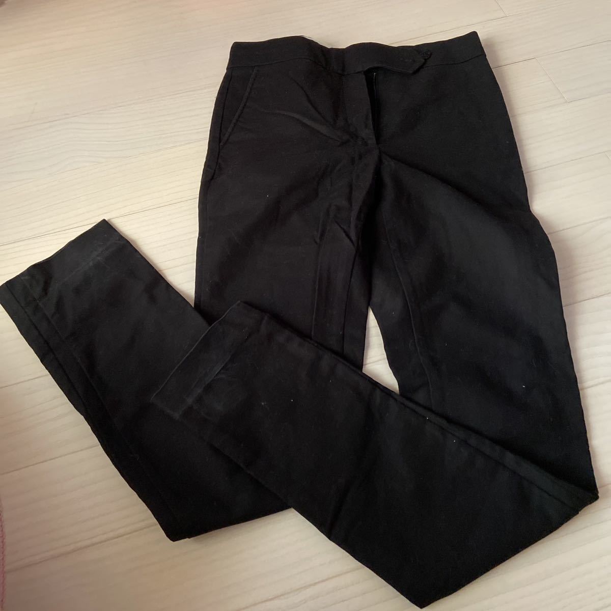 女性　黒　パンツ　H&M EUR34/US4/CA4_裾が白っぽくなっています