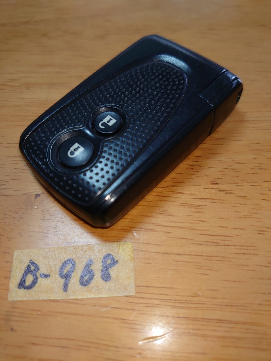 B-968 ダイハツ 純正 スマートキー 2ボタン 刻印 007YUUL0498 ムーヴ LA100S タント L375Sココア L675S コンテ L575S エグゼ L455S_画像3