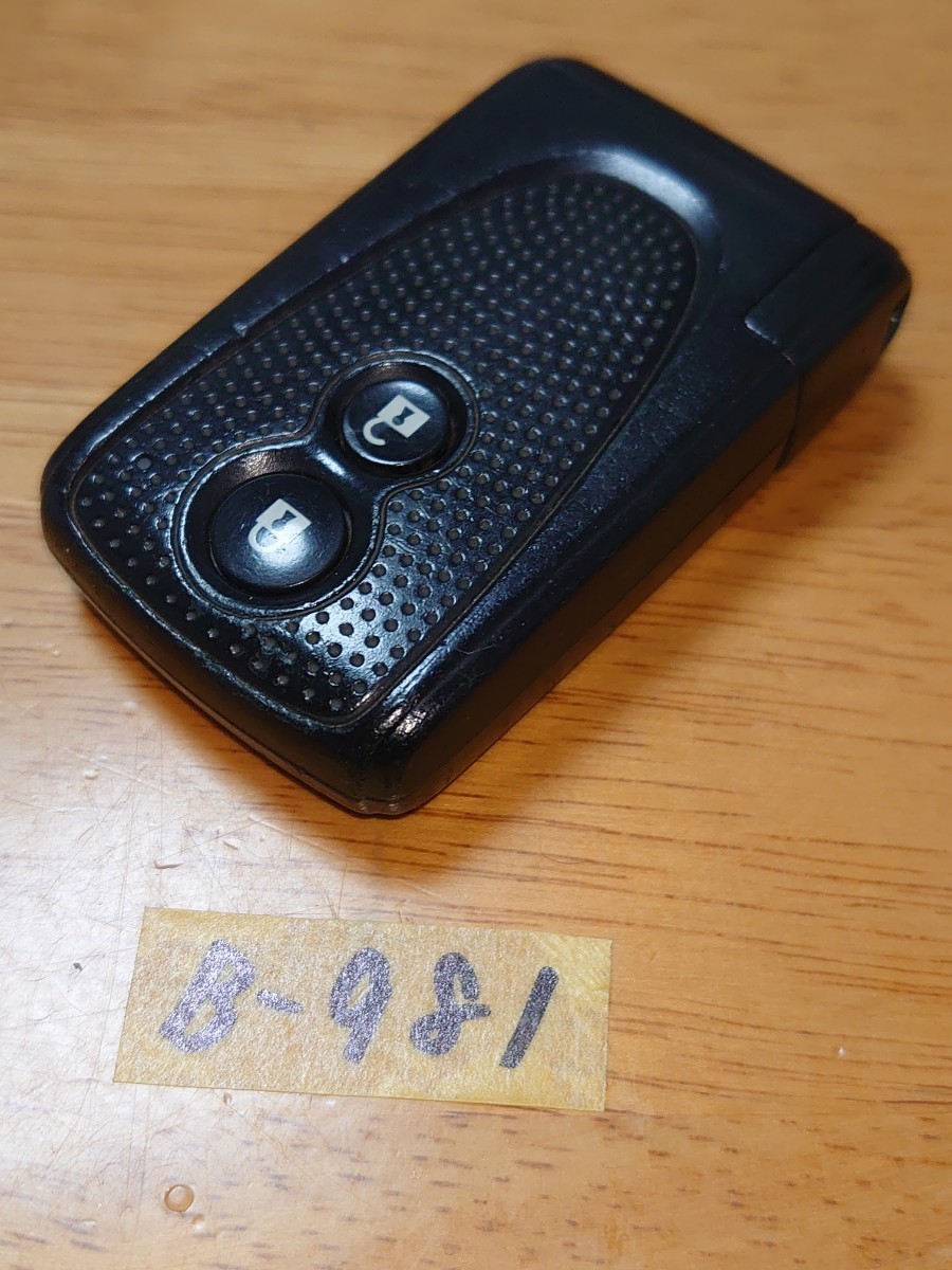 B-981 ダイハツ 純正 スマートキー 2ボタン 刻印 007YUUL0498 ムーヴ LA100S タント L375Sココア L675S コンテ L575S エグゼ L455S_画像3