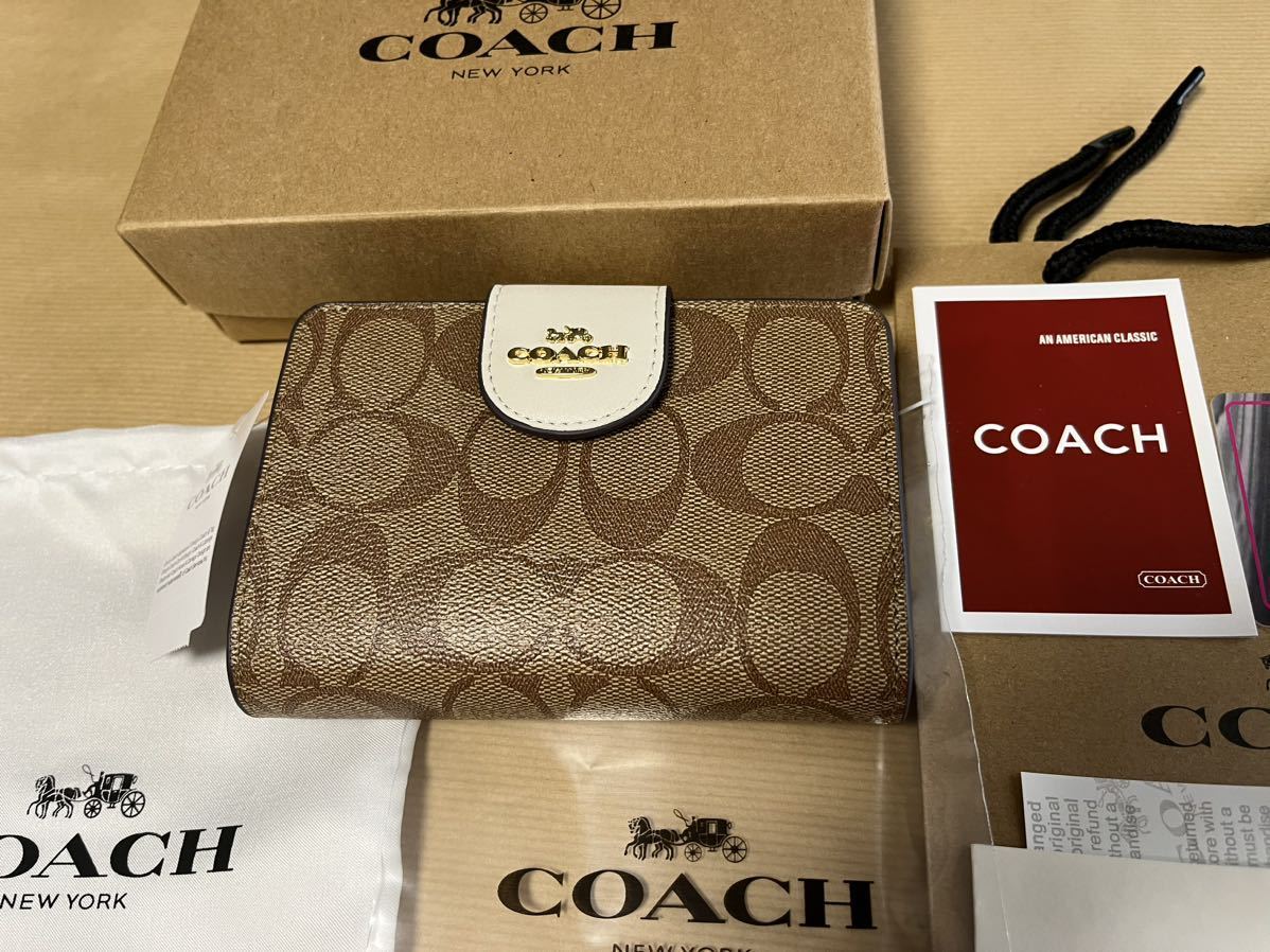 コーチ COACH 二つ折り 財布 ウォレット シグネチャー柄 カーキ ホワイト 白　アウトレット_画像1