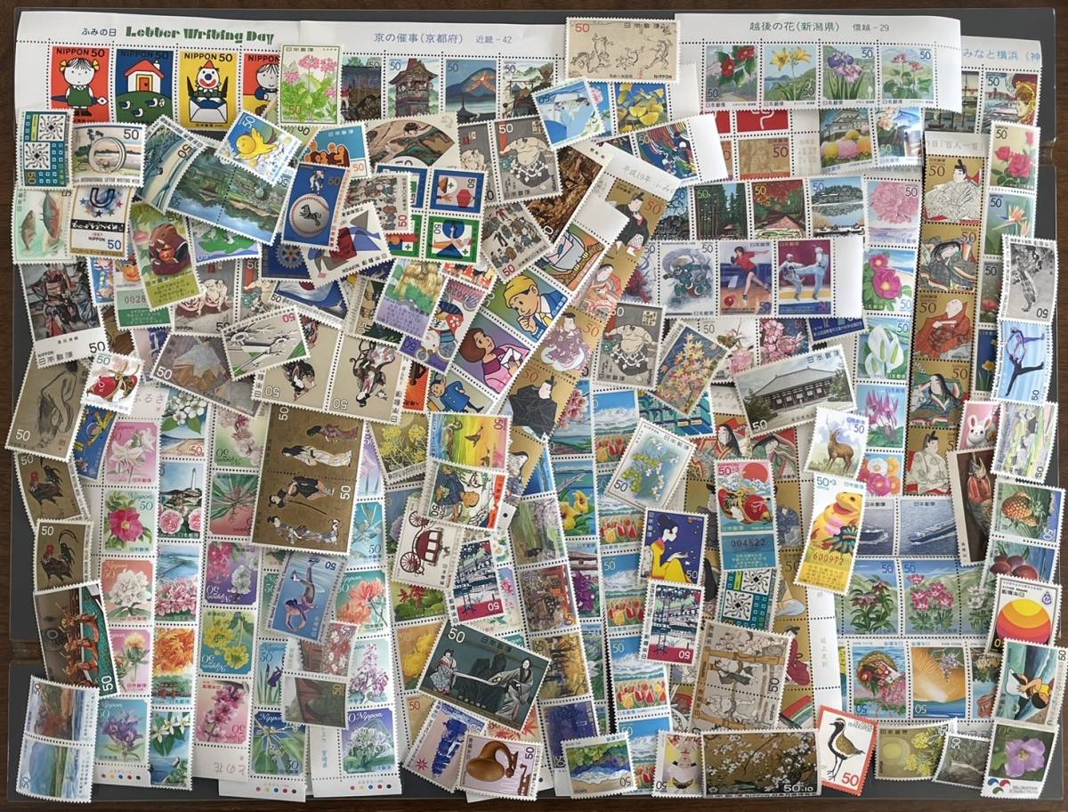 切手　未使用　額面32,000円　50円 x 640枚　記念切手　郵便切手　バラ　まとめて_画像1