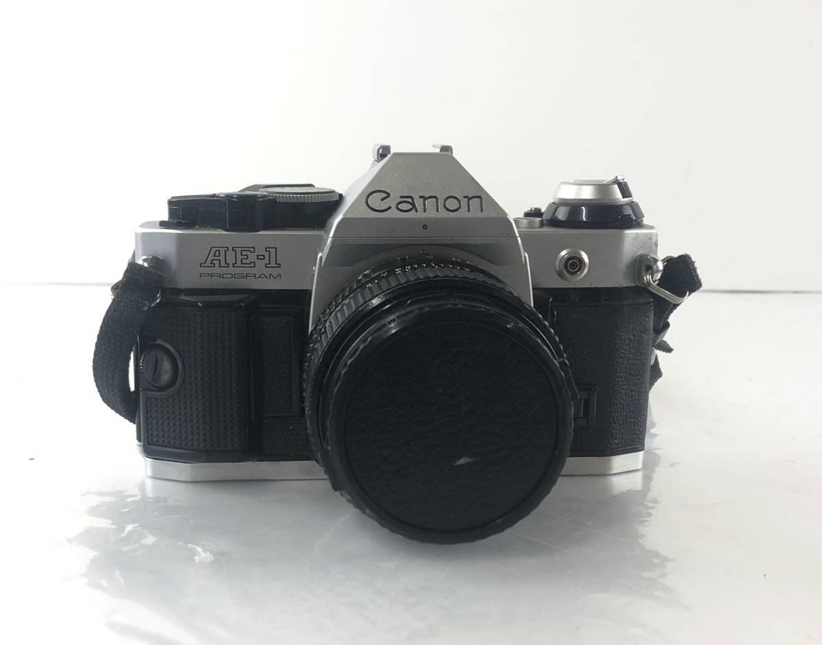 【SU174】Canon キャノン AE-1 PROGRAM フィルムカメラ CANON LENS FD 50㎜ 1:1.4 CANON LENS MADE IN JAPAN レンズ_画像1