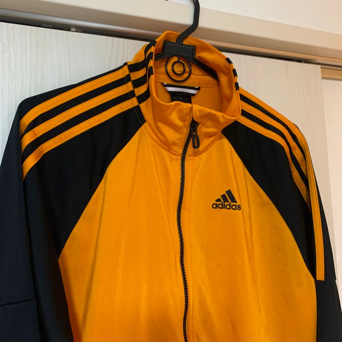 アディダスadidas トラックジャケットジャージ オレンジx黒 アディダスadidas トラックジャケットジャージ オレンジx黒
