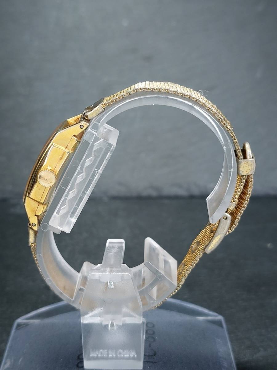 SEIKO SOLAR セイコー ソーラー DIASHOCK ダイアショック 549 アナログ 手巻き 腕時計 ゴールド シルバー文字盤 メタルベルト ステンレス_画像4