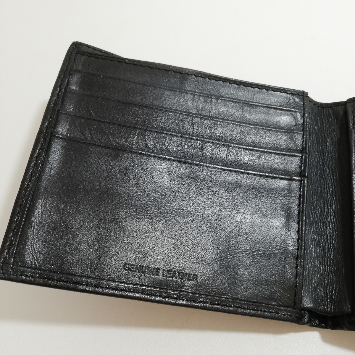 Calvin Klein カルバンクライン ブラックレザー エンボス総柄 二つ折り財布 黒 11.2cm×9.5cm [財布 本革 74285]_画像6