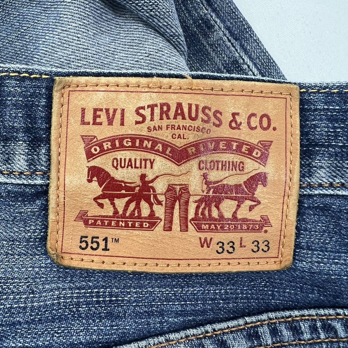 Levi's ☆ 551 かっこいい色落ち◎ ストレッチ デニムパンツ ブルー ジーンズ 膝裏地補強リペア W33 アメカジ 古着 リーバイス■Ja6954_画像6