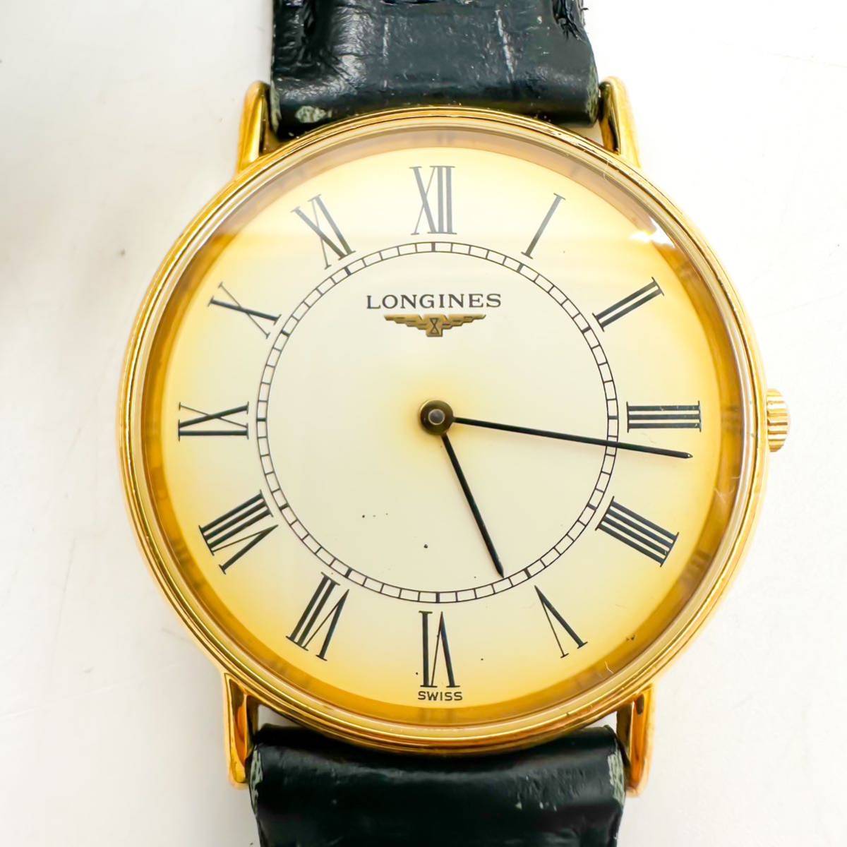 ●【売り切り】ロンジン LONGINES 腕時計 L4.637.2 ラウンド ローマン 白文字盤 ゴールドカラー クォーツ 2針 メンズ _画像1