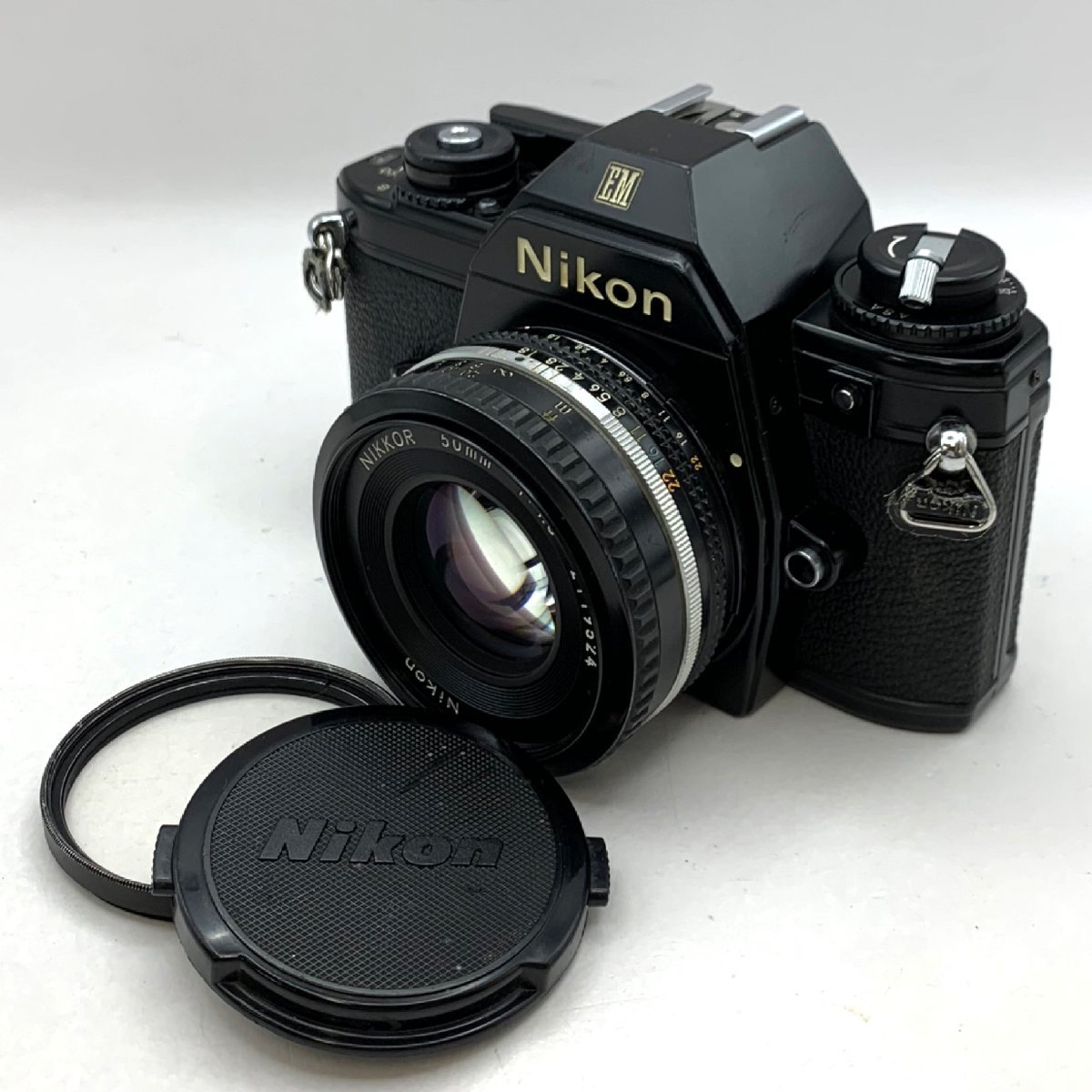 1円～/Nikon/ニコン/EM/レンズ付/NIKKOR/50mm/F1.8/フィルムカメラ/一眼レフ/シャッターOK/通電確認済/ジャンク/I076_画像1