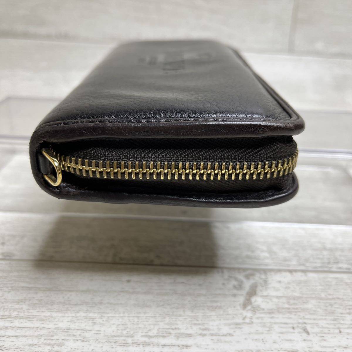 【美品】ロエベ LOEWE ヘリテージ ロゴ 刻印 型押し 長財布 ジッピーウォレット wallet ラウンドファスナー ブラック 黒レザー金具メンズ_画像5