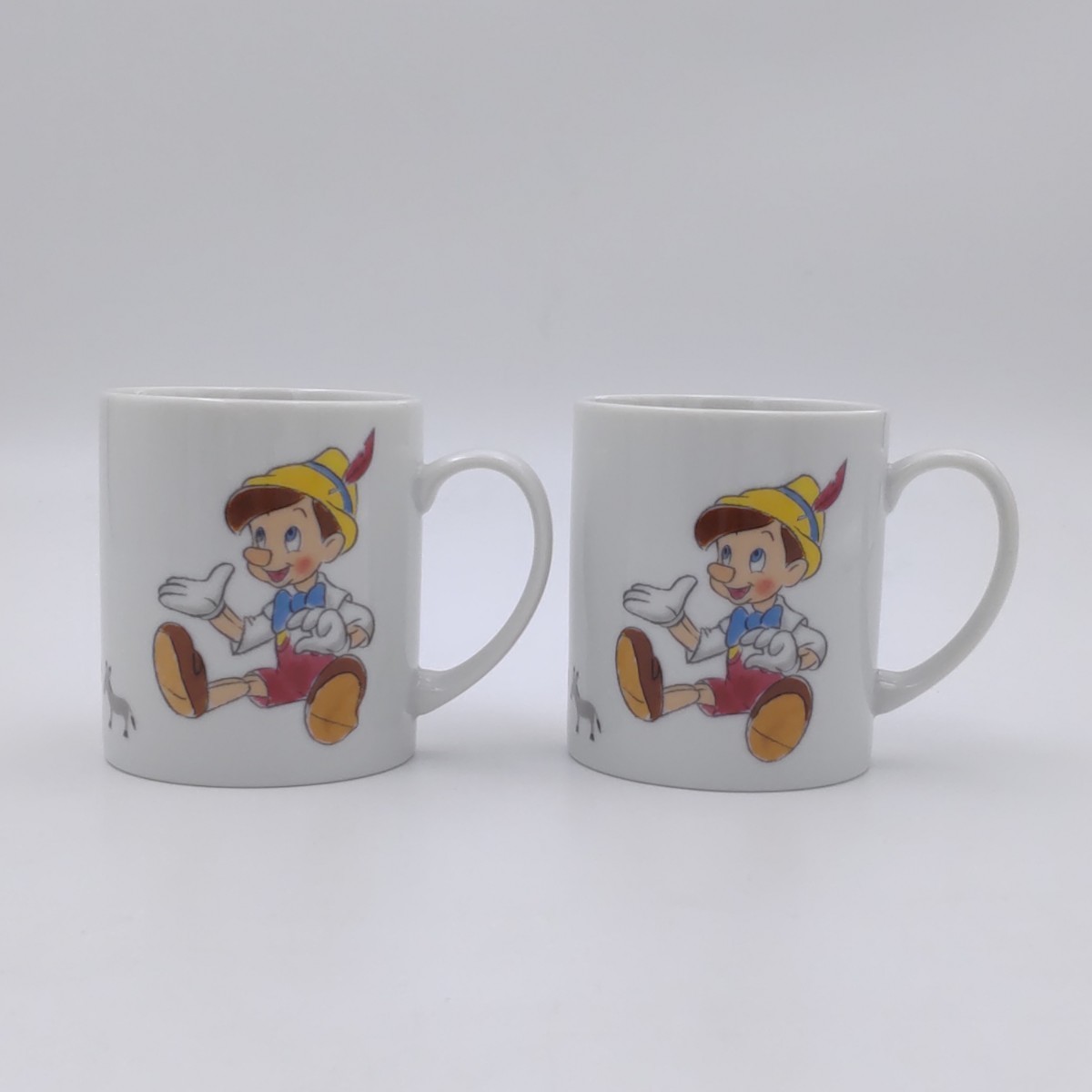 ディズニー ピノキオ マグカップ 2個 Walt Disney Pinocchio mug Sony Creative Products 新品 未使用 訳あり含む お買い得 箱なし_画像1