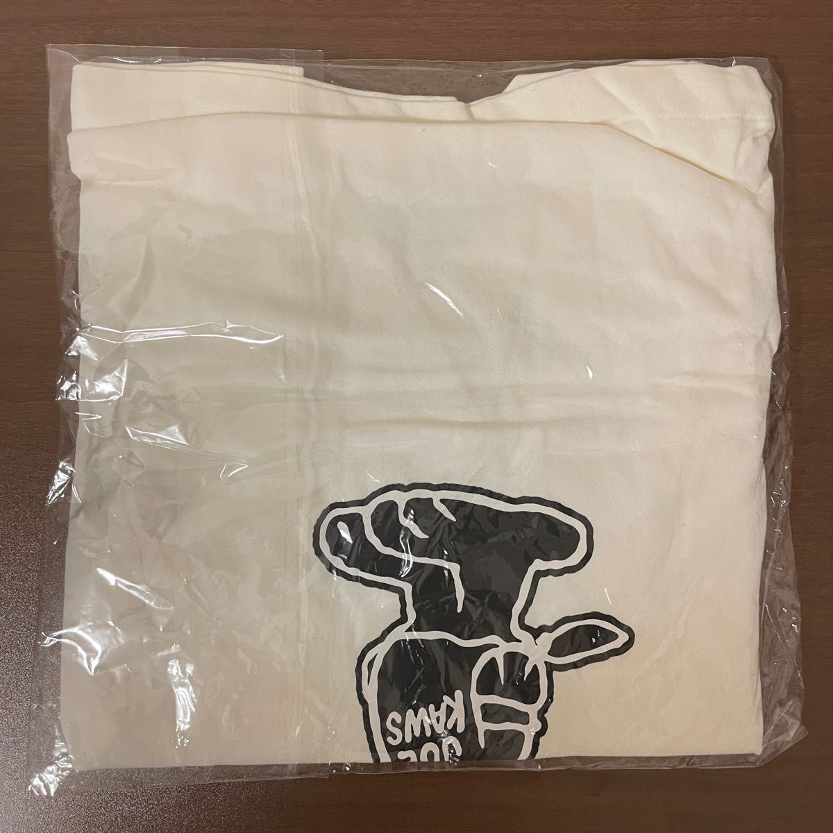 スヌーピー　カウズ　Kaws PEANUTS ユニクロ　Tシャツ　Mサイズ　新品