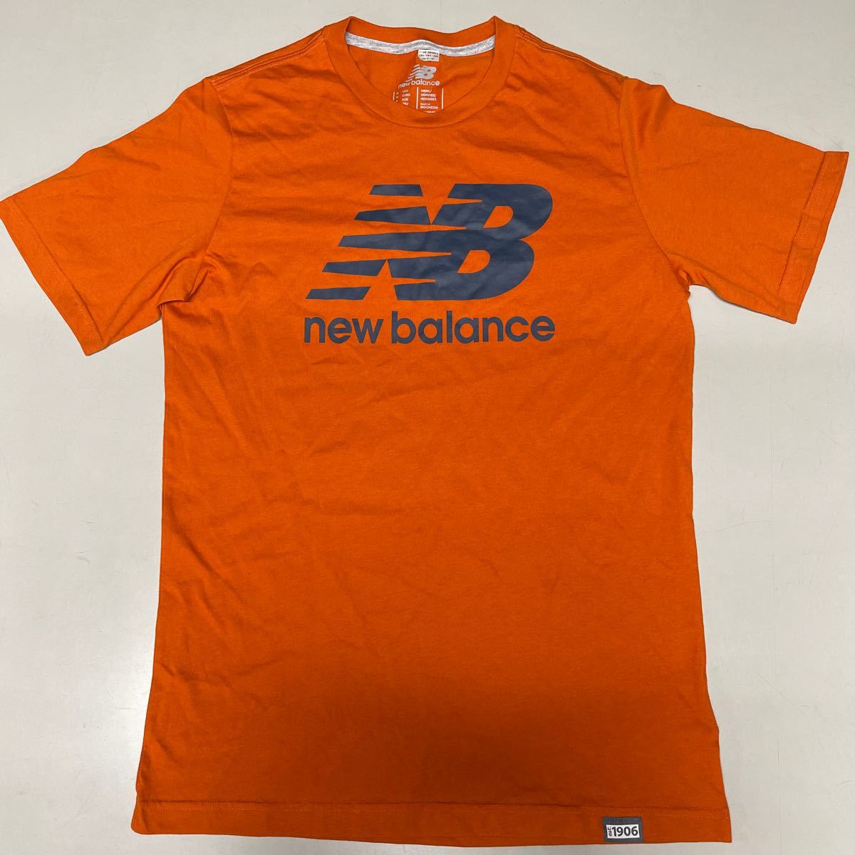 New Balanceニューバランス 未使用 Tシャツ Lサイズ メンズ 半袖 オレンジ ロゴ LOGO_画像1