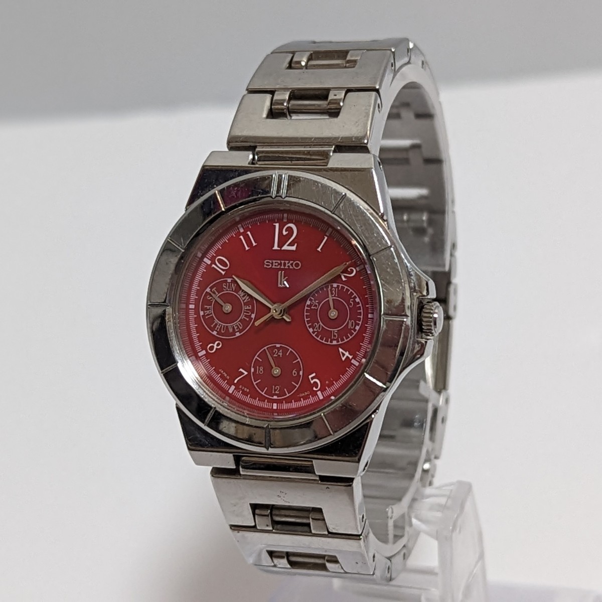 SEIKO セイコー LUKIAルキア 5Y89-0830 トリプルカレンダー 赤文字盤 QUARTZ クォーツ シルバー レディース 3針 腕時計 中古 D81_画像1